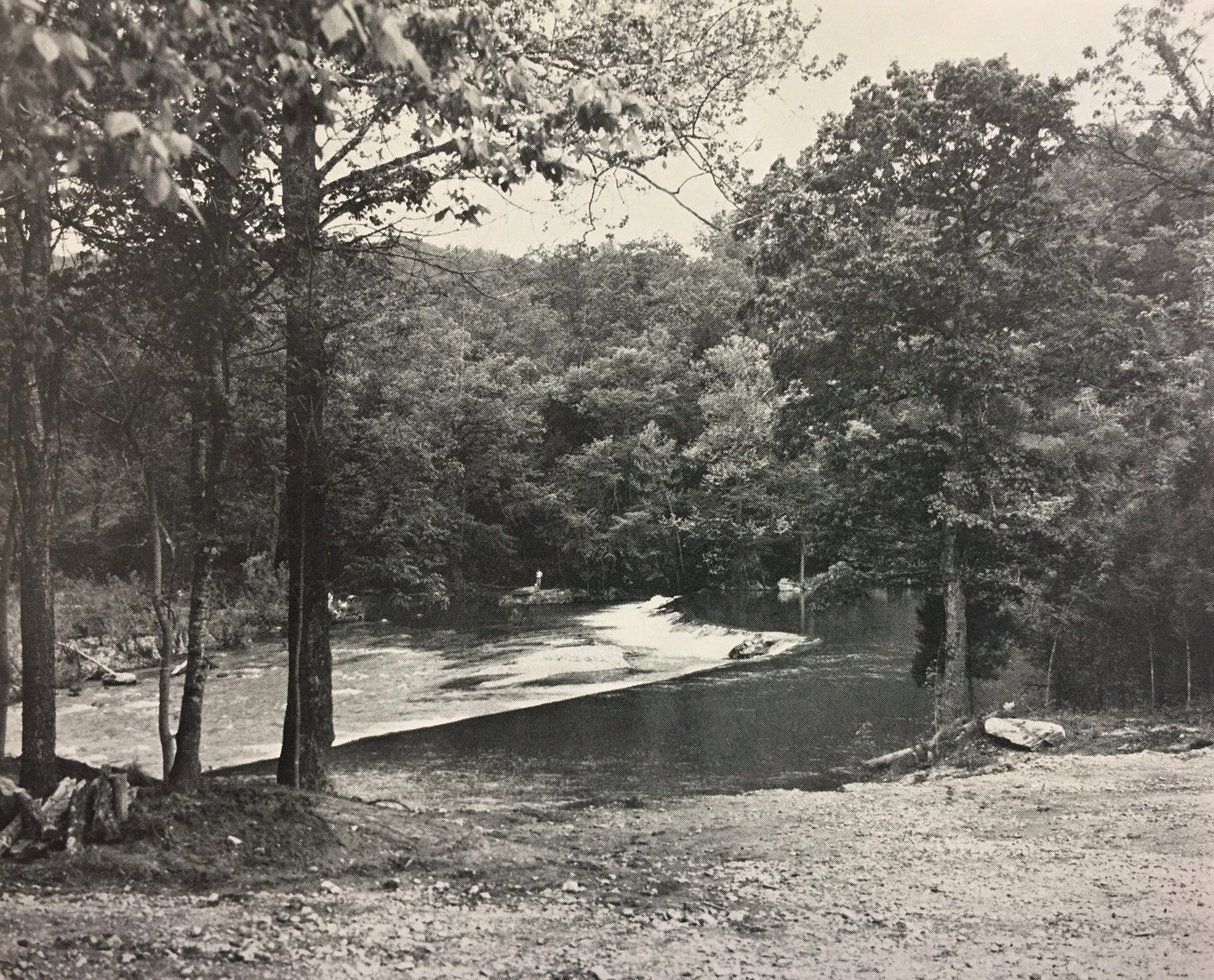 Standing near the new eating area, looking across the river to Grandma’s fishing rock, this is a view of the new Dawt landing. [The face of the river looks quite different today, with the dam gone.]